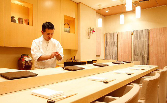 The owner/chef carefully crafts every piece of sushi.